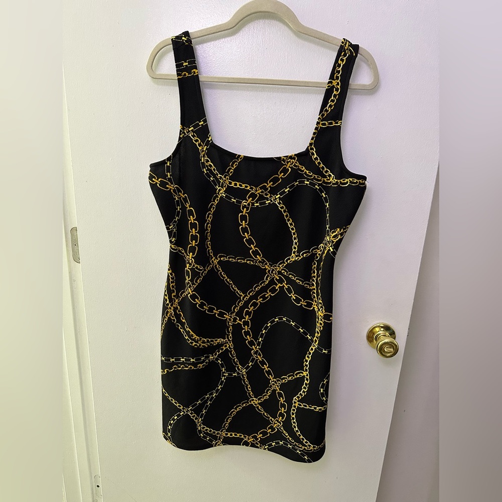 Black and gold mini dress
